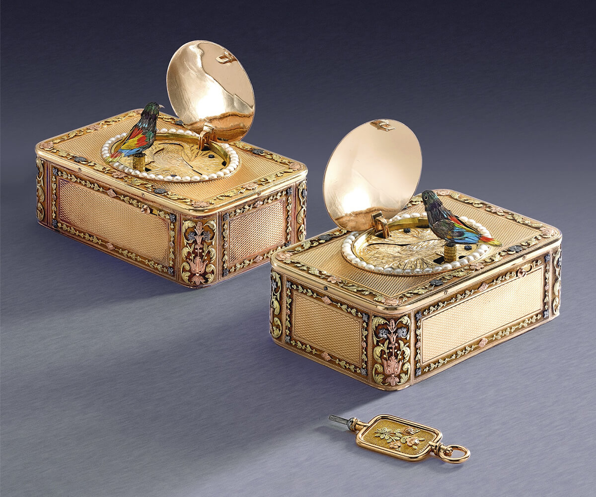 Frères Rochat pair of four-colour gold and pearl singing bird snuff boxes