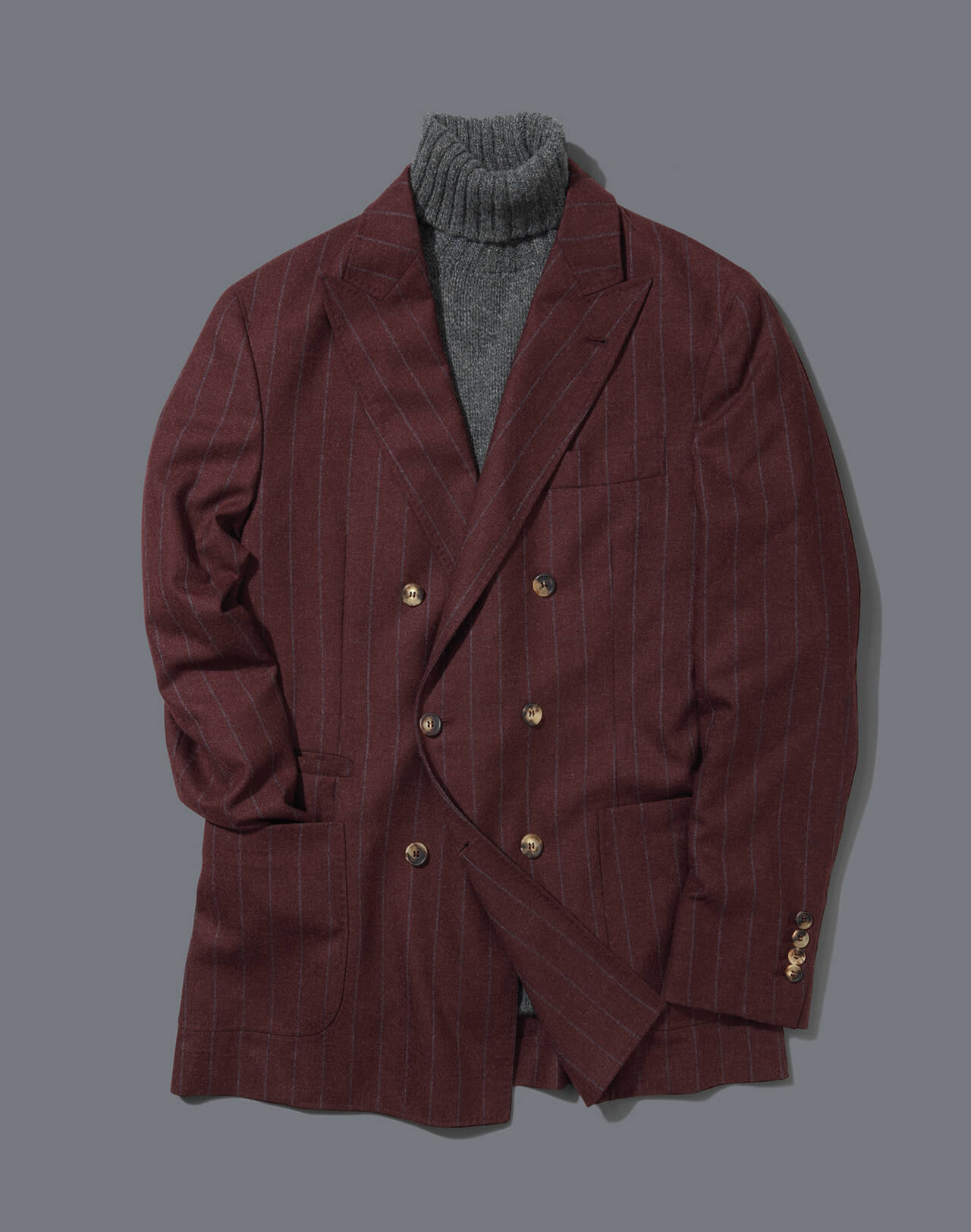 Brunello Cucinelli Pinstripe Double-Breasted Jacket & Malloch’s Chunky Lambswool Rollneck Jumper