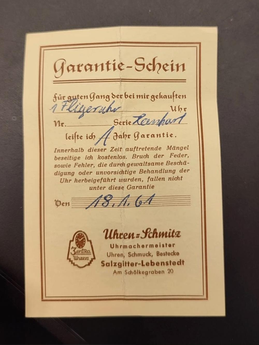 Original German guarantee certificate for a Hanhart pilot’s watch, handwritten and dated 18 January 1961. Issued by Uhren-Schmitz in Salzgitter-Lebenstedt, the period document records the watch as a “Fliegeruhr” and provides valuable provenance for the vintage Hanhart 417 ES.