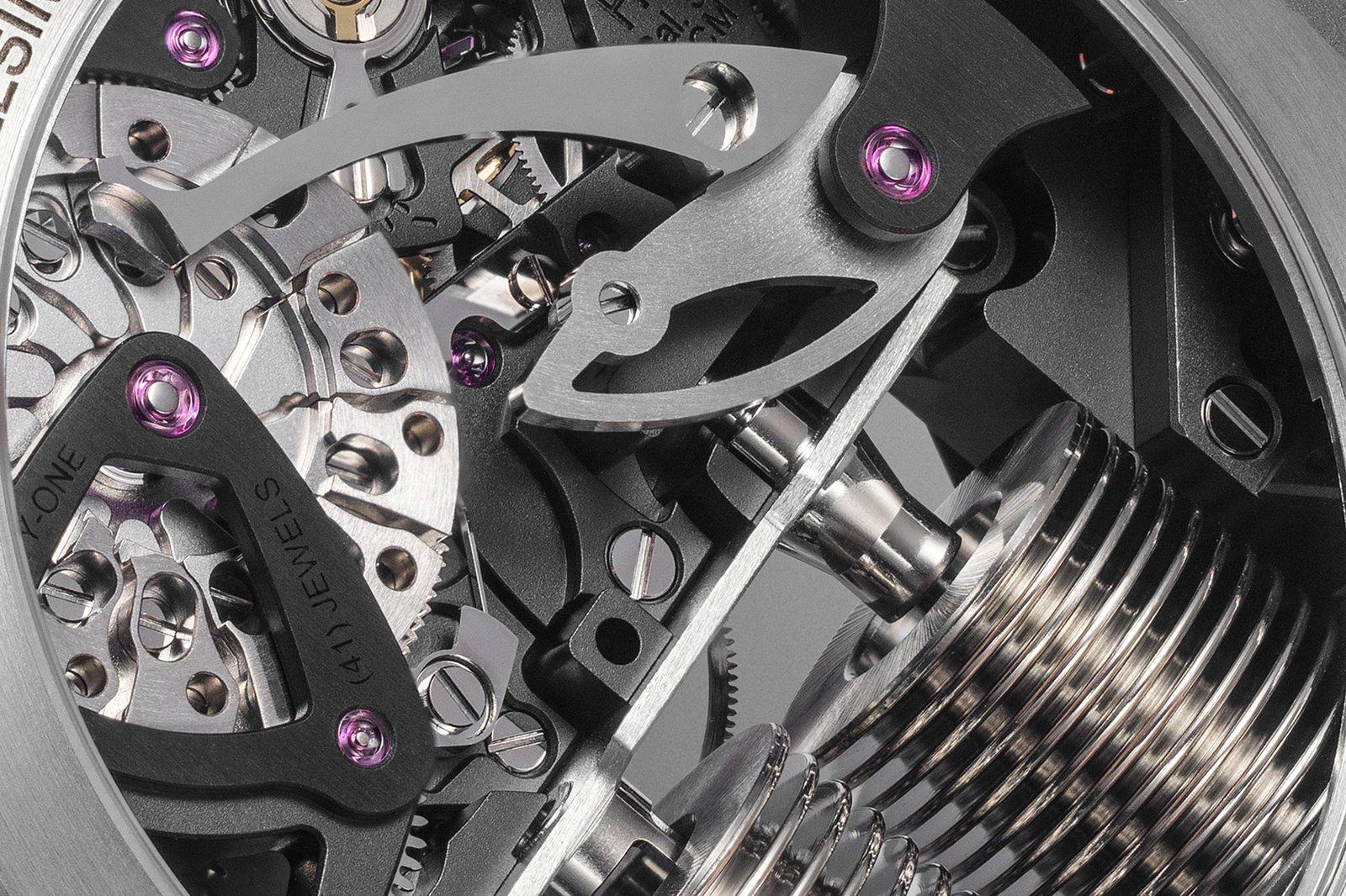 HYT S1 Titanium Orange caseback showing the fluidic module bellows